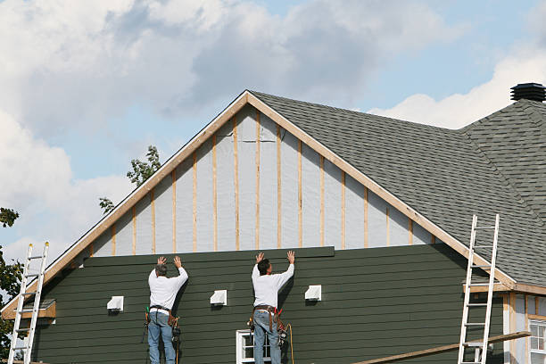 Professional Storm Damage Siding Repair technician working in Circleville, OH